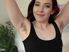 Ember Stone rubs her hairy pubes for you