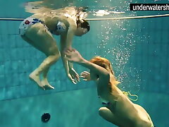 Andrea and Monica warm teens in the pool